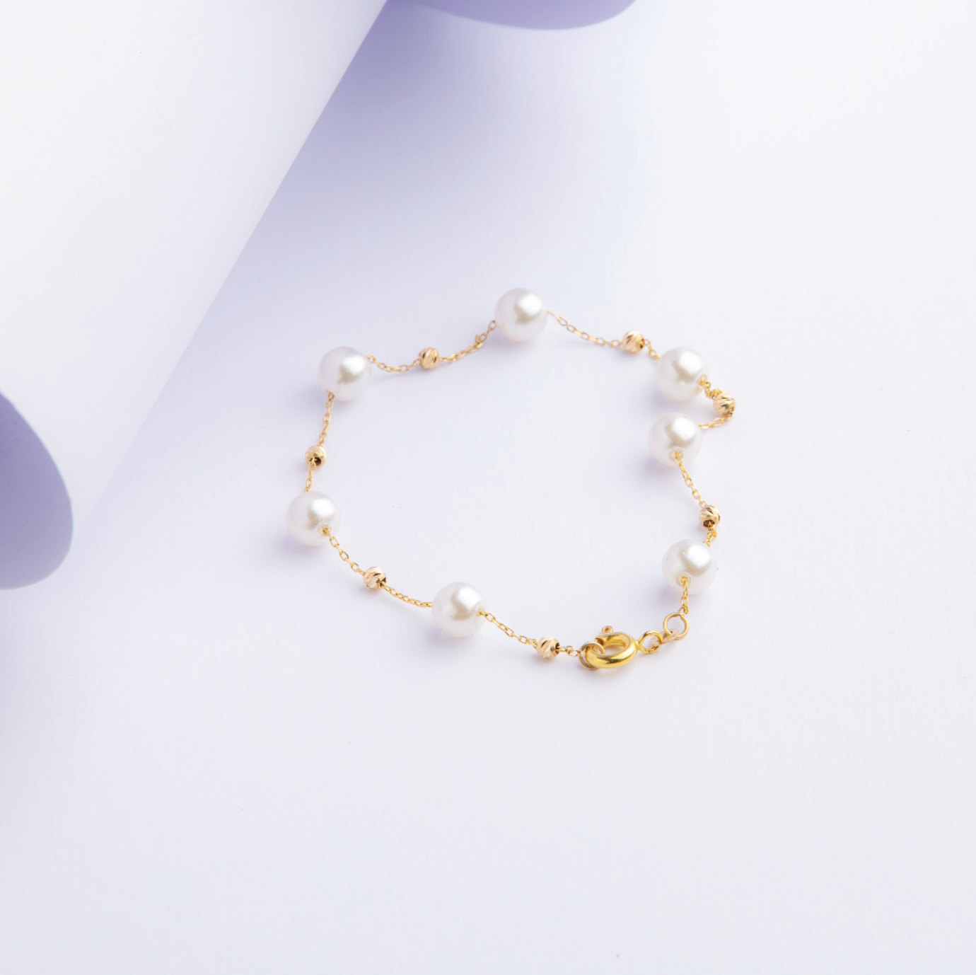 Rada-bracelete-morvarid.png دستبند طلای ۱۸ عیار مدل مروارید - Image 1